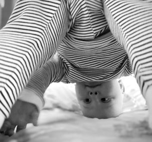 Mason doing handstand, black and white