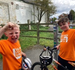 Teddy and Oliver after challenge on bikes