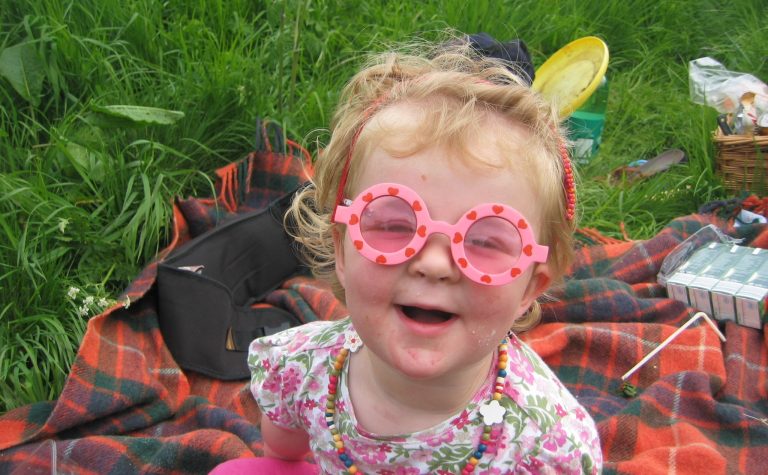 Libby as child in sunglasses