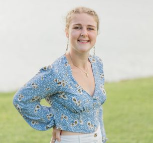 Libby smiling at camera in Summer