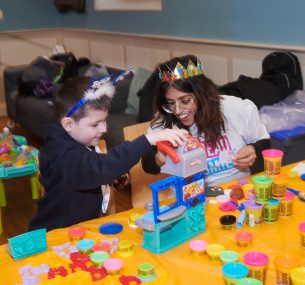 Jacob loved playing with the toys at the Spread a Smile parties