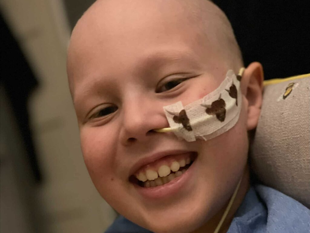 Harrison smiling with nose tube