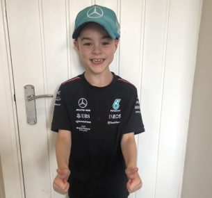 Barney wearing F1 Mercedes cap and tshirt