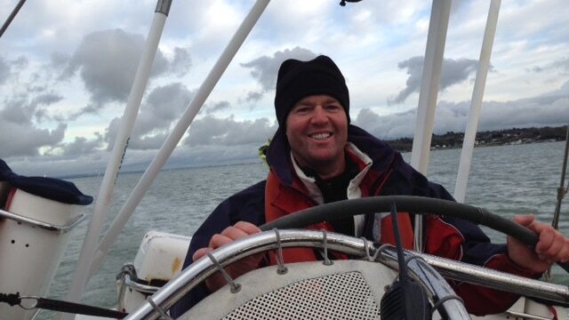 Man sailing a boat
