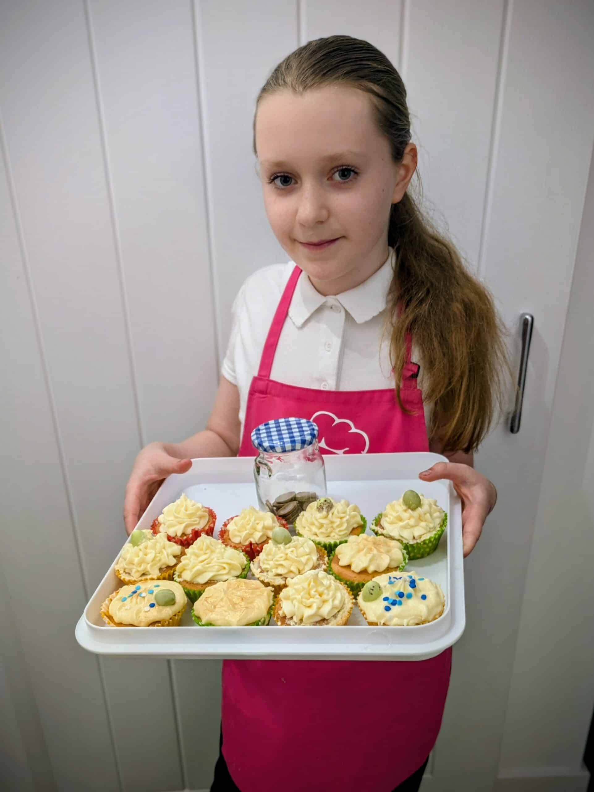 Izzy at her cupcake fundraiser for Children with Cancer UK